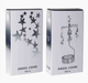 2 boxes with "Angel Chime Night Sky." ne box with silver star drawing on white background. The other with image of rotary spinner with silver stars and a tea light on white background.