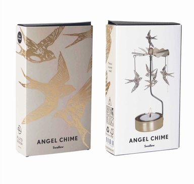 Two product boxes for an Angel Chime Swallow, one showing gold bird illustrations on a light beige background and the other showing the gold metal swallow chime with a tealight candle in a white box, set against a plain white background.