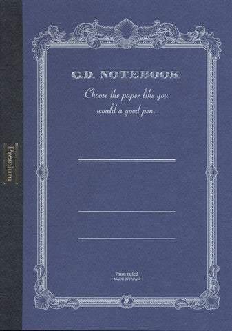 Blue notebook cover with decorative frame and text on a black background
