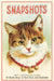 Included postcard example- Vintage-style image with a cat wearing a red collar and the text 'Snapshots Pet Photographer' on a light background.
