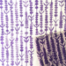 Lavender and cream fabric featuring a repeating vertical lavender plant pattern, with the same pattern on the printing block displayed on top.