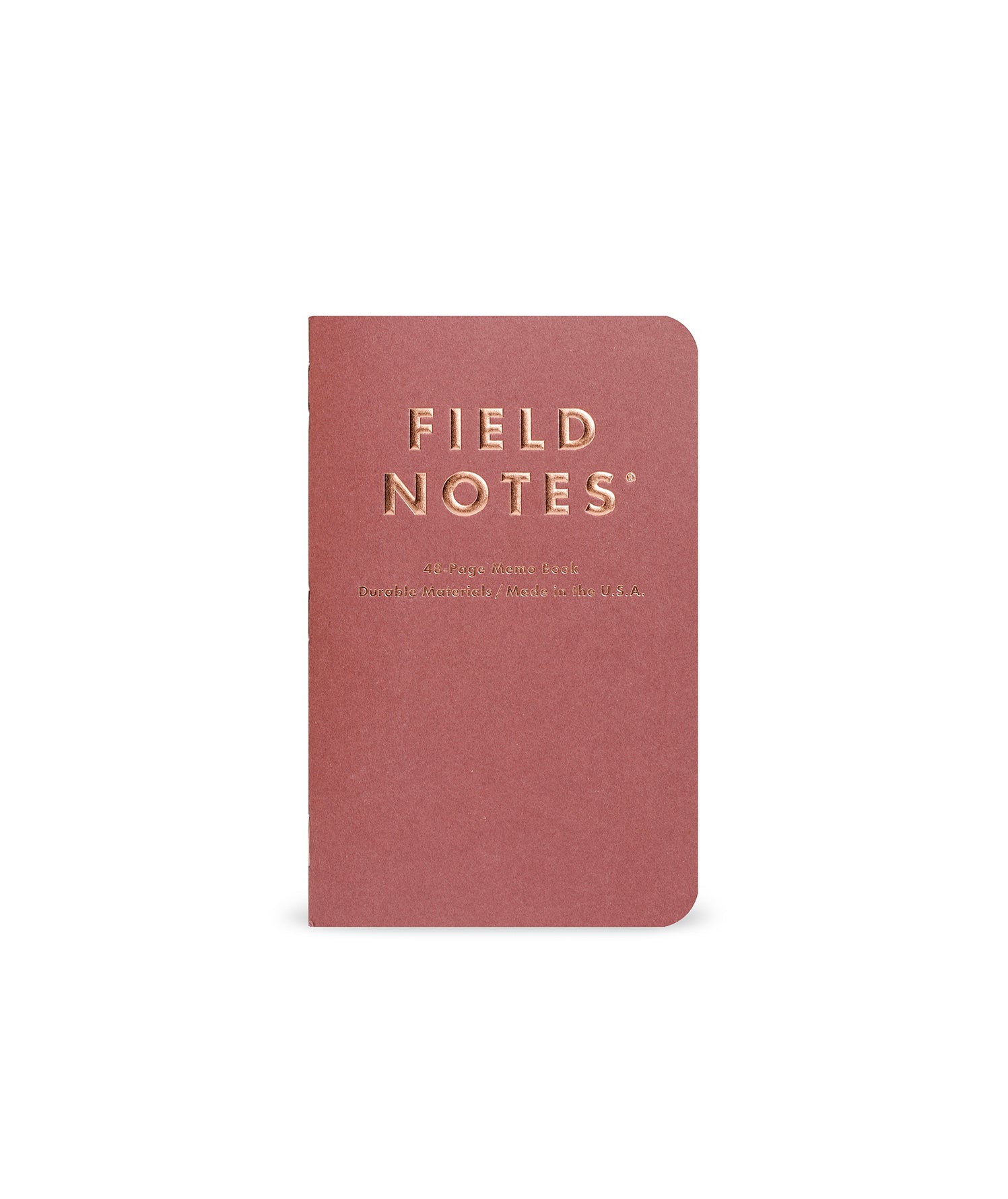 Pink notebook with 'Field Notes' branding on a white background