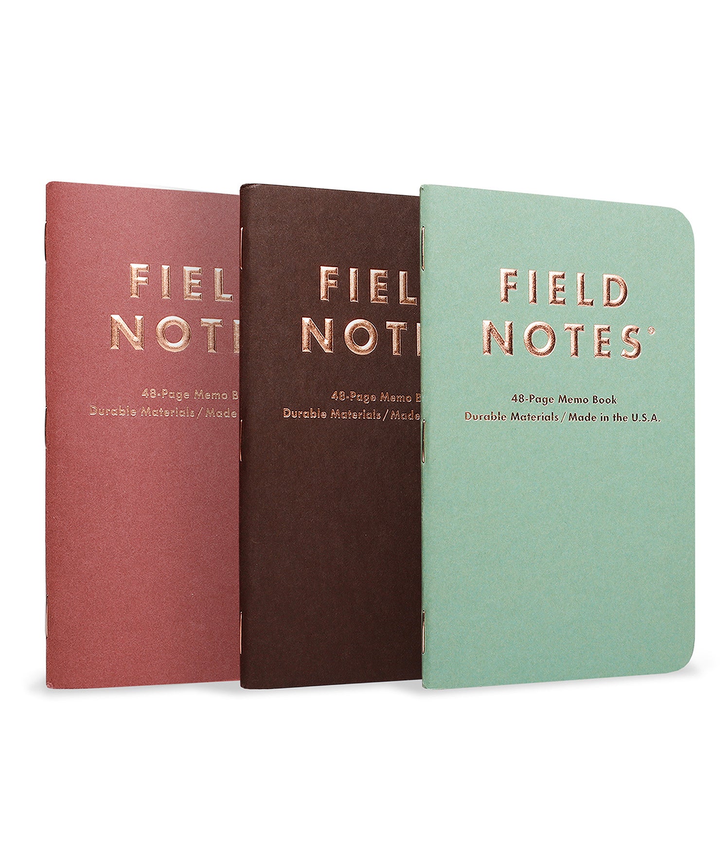 Field Notes Lucky Edition 3-Pack- Three 'Field Notes' notebooks in different colors on a white background