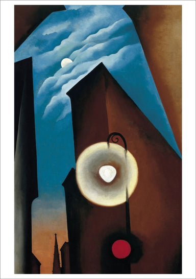 Georgia O’Keeffe: Architecture Boxed Notecard Assortment- card image showing a stylized artwork depicting a moonlit city scene with angular buildings, a glowing street lamp, and a blue sky with clouds.
