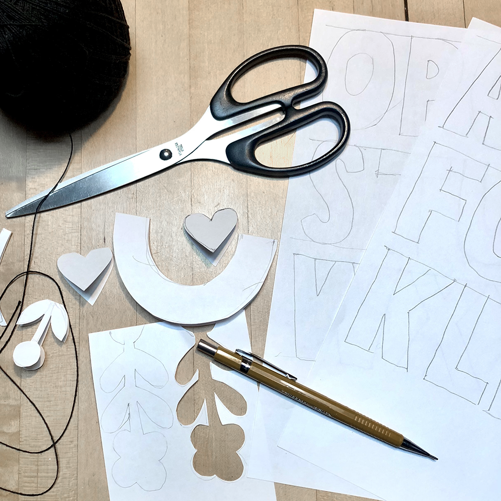 Birds, Hearts, & Words - A Banner using simple materials- string, paper, scissors