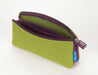 A lime green felt zipper pouch with a purple interior lining and a silver metal zipper pull, shown open on a white background.