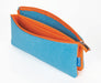 A blue felt pencil case with an orange zipper and orange interior lining, shown open on a white background. 