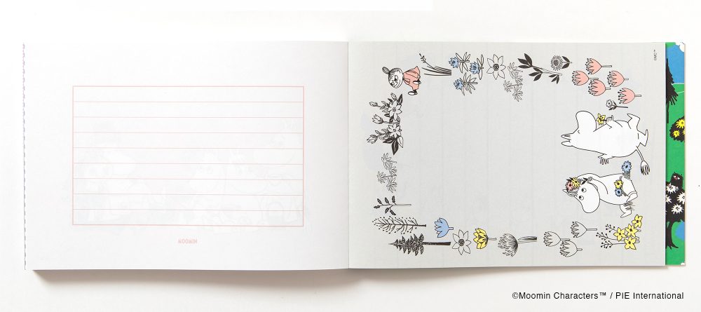 An open Moomin-themed writing notebook or journal on a white background, showing one blank lined page on the left and a decorated illustrated page on the right with Moomin characters and floral border drawings.