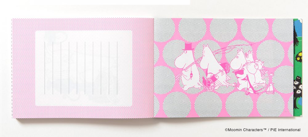 Moomin Writing and Crafting Papers- example pages- the left page is light pink with a white lined writing area, and the right page has a pink and gray polka-dot pattern with white Moomin character illustrations.