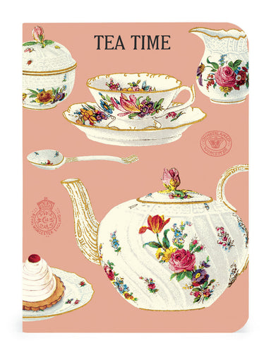 Mini notebook with decorative tea time design with teapots, teacups, and a cake on a pink background.