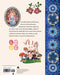 Nathalie Lété Sticker Book- Back cover of a book with illustrations of a fairy, flowers, and mushrooms, and text about stickers by Nathalie Leté.