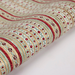 Roll of patterned paper with red, green, and gold patternes on a white background