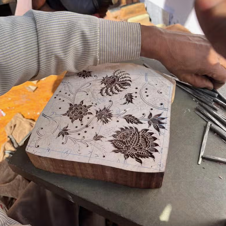 wood block carving in process- sample of paper pattern block