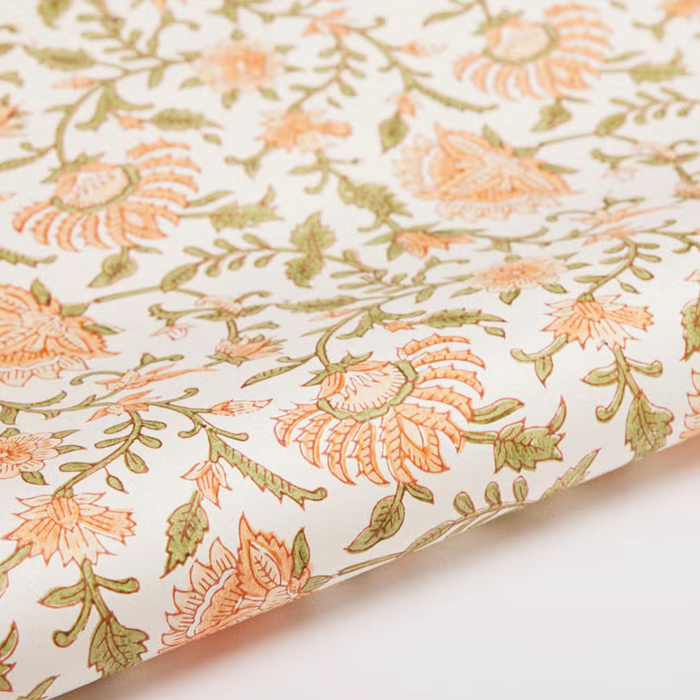 Block printed foral flowers with green leaves on white background- detail