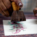 Hand Block Printed Single Card- Paisley bouquet-  mint rose ink with hands showing block printed process final step