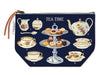 Pouch with tea-themed design featuring teacups, teapots, and pastries on a navy background.