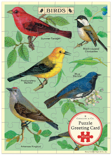Jigsaw puzzle greeting card with illustrations of birds on a green background