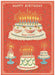 Jigsaw puzzle greeting card with a birthday cake design on a red background