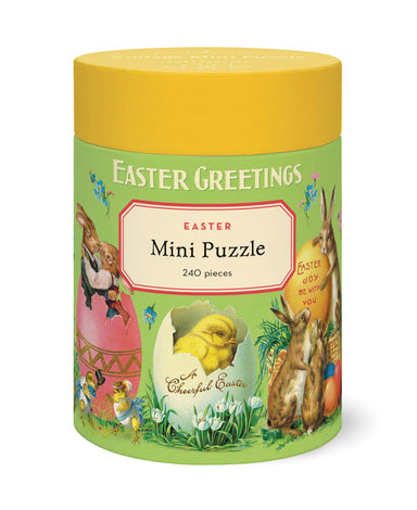 Easter Mini Puzzle in a cylindrical tin container with a yellow lid and a green illustrated label featuring bunnies, an egg, a chick, and floral Easter motifs.