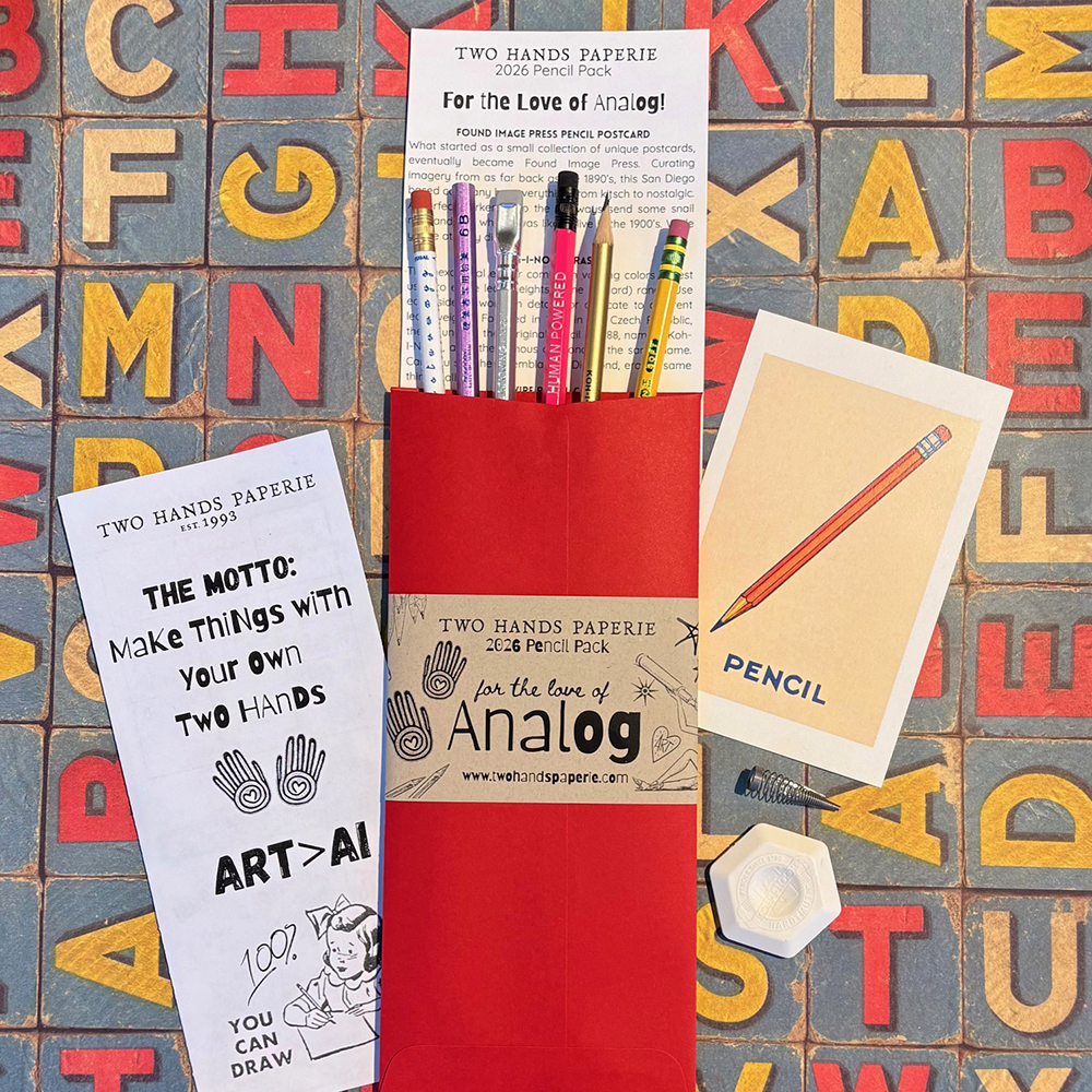 THP 2026 Limited Edition Pencil Pack- packaging, info card and pencils shown in envelope on alphabet paper