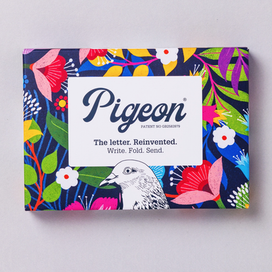 Pigeon letter writing set with colorful floral design on a gray background