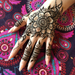 Designs in Henna on the back of a hand