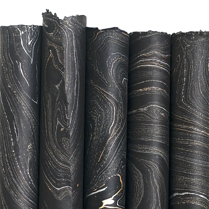 Handmade Marbled Paper- Black with Silver and Gold 5 sheets rolled to show pattern variations