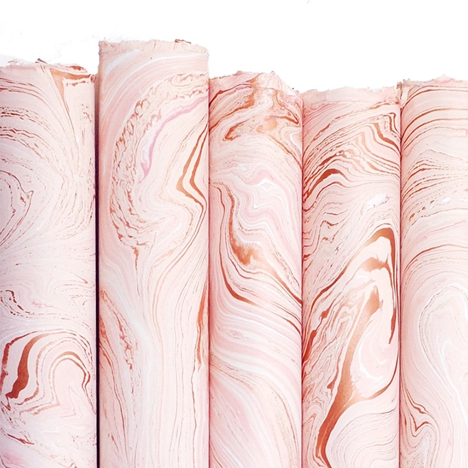 Marbled Paper- "Rose Gold" pale pink marbling with white and metallic copper highlights 5 sheets rolled to show pattern variations