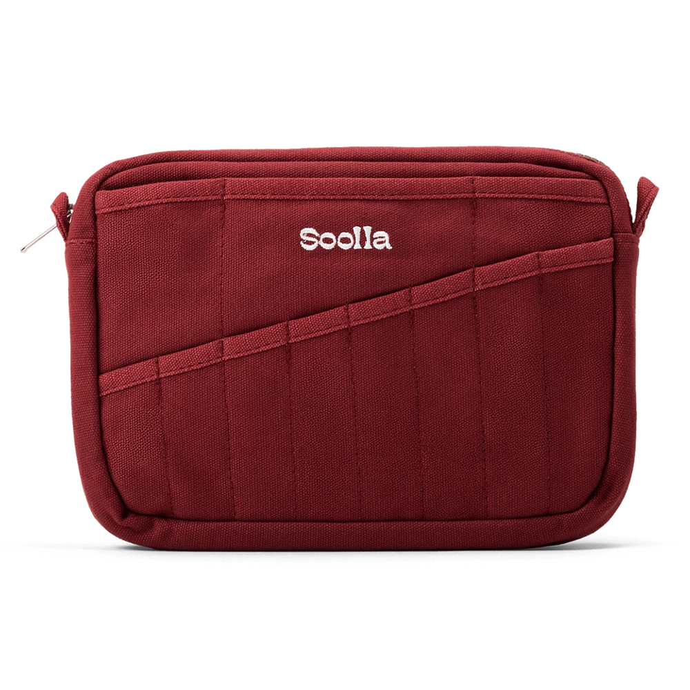 A burgundy red pouch with various pen pockets on the front, featuring the brand name 'Soolla' embroidered in white in the top center, set against a plain white background.