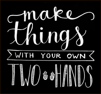 calk board with white writing "Make things with your own two hands"