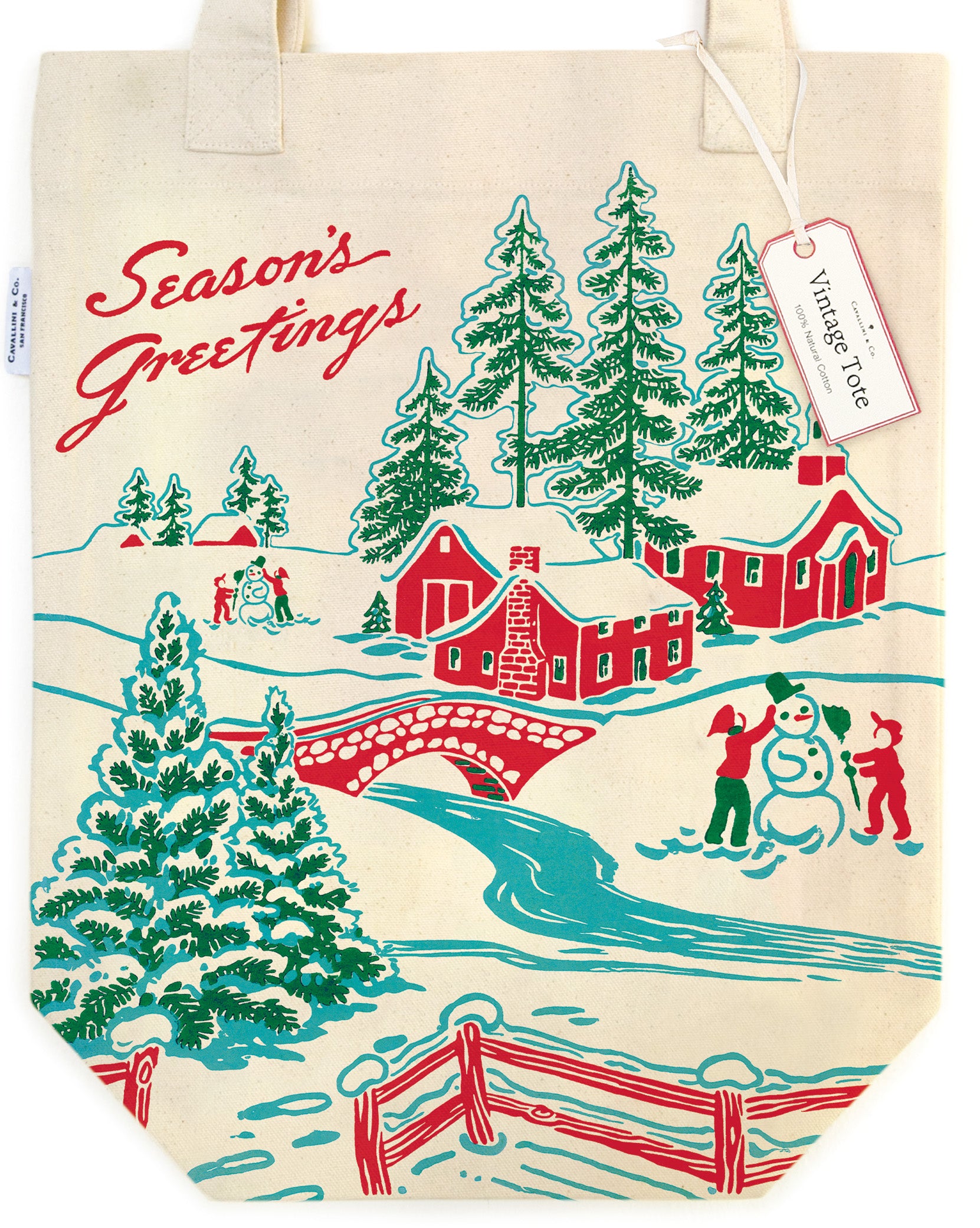 Cavallini & Co. Christmas Winter Wonderland Tote Bag- detail of tote bag with Christmas design featuring trees, houses, and people making a snowman.