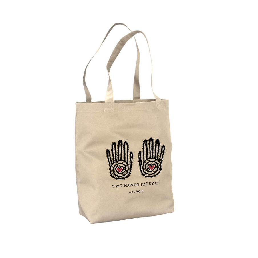 Two Hands Paperie tote bag on white background