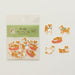 Set of Shiba Inu dog-themed stickers with packaging on a white background, image shows 5 different designs included in the set. 