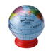 Small globe with a red stand on a white background