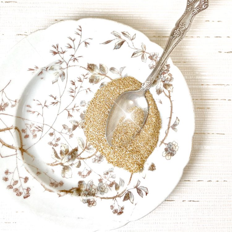 Authentic German Glass Glitter- Gold on plate with spoon