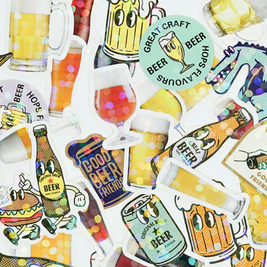 Collection of colorful beer-themed stickers on a white background