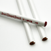 white Heart-shaped pencil with red text on a white background