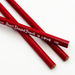 Red heart-shaped pencils on a white background
