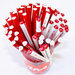 Red and white heart shaped pencils with 'LOVE' and heart designs in a clear container on a white background.