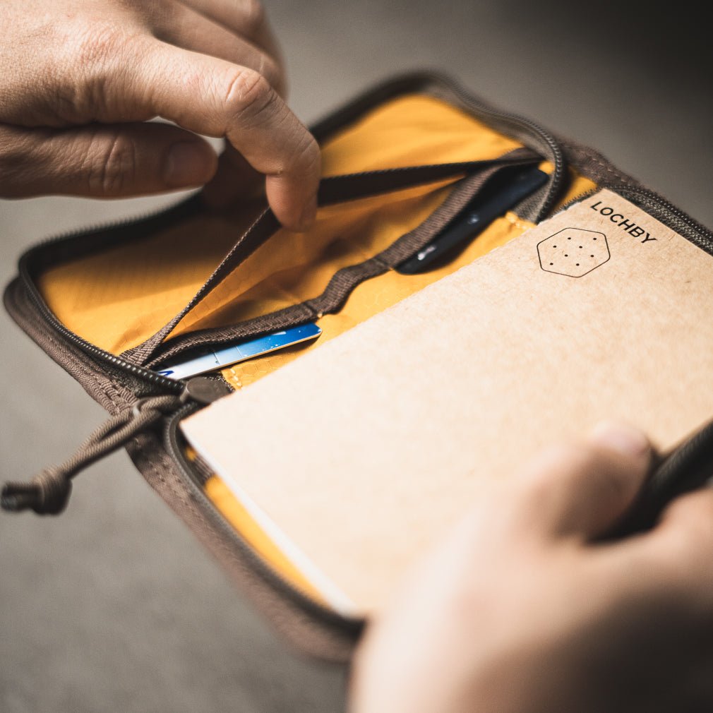 Lochby Pocket Journal in brown with yellow interior showing pockets for credit cards