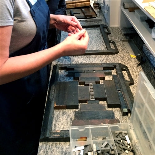 Valentines! DIY Letterpress Cards In-Studio Class - student hand setting type