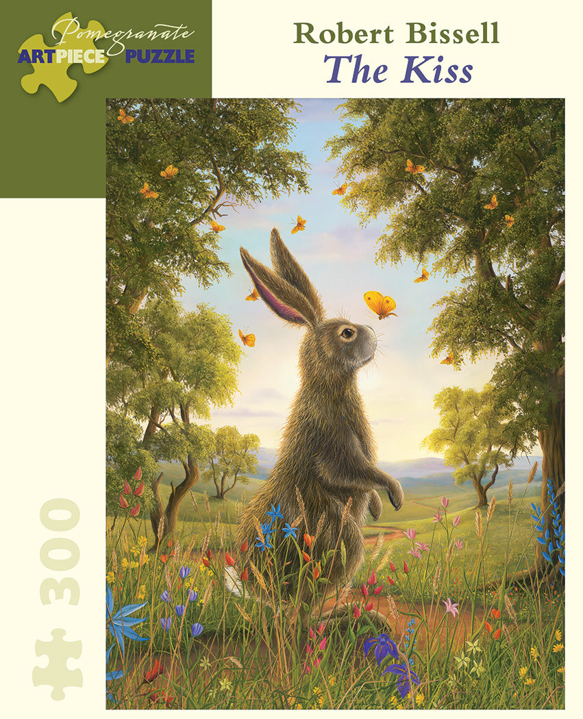 Ready for a manageable, 300 piece puzzle. "The Kiss", by Robert Bissell, shows a rabbit surrounded by green trees and rolling hills.