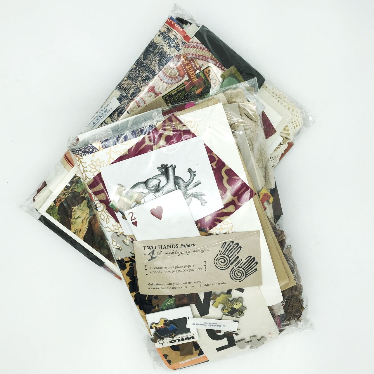 You never know what you might find- paper of course (lokta, unryu, mango, banana, printed papers from Rossi and Cavallini, Japanese and Indian recycled are some you might find), envelopes, cards, photographs, slides, magnets, buttons, bags, ribbon, book cloth, and on and on. 