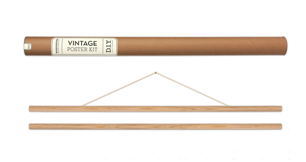The kit includes two dowels with adhesive and a string for hanging. 
