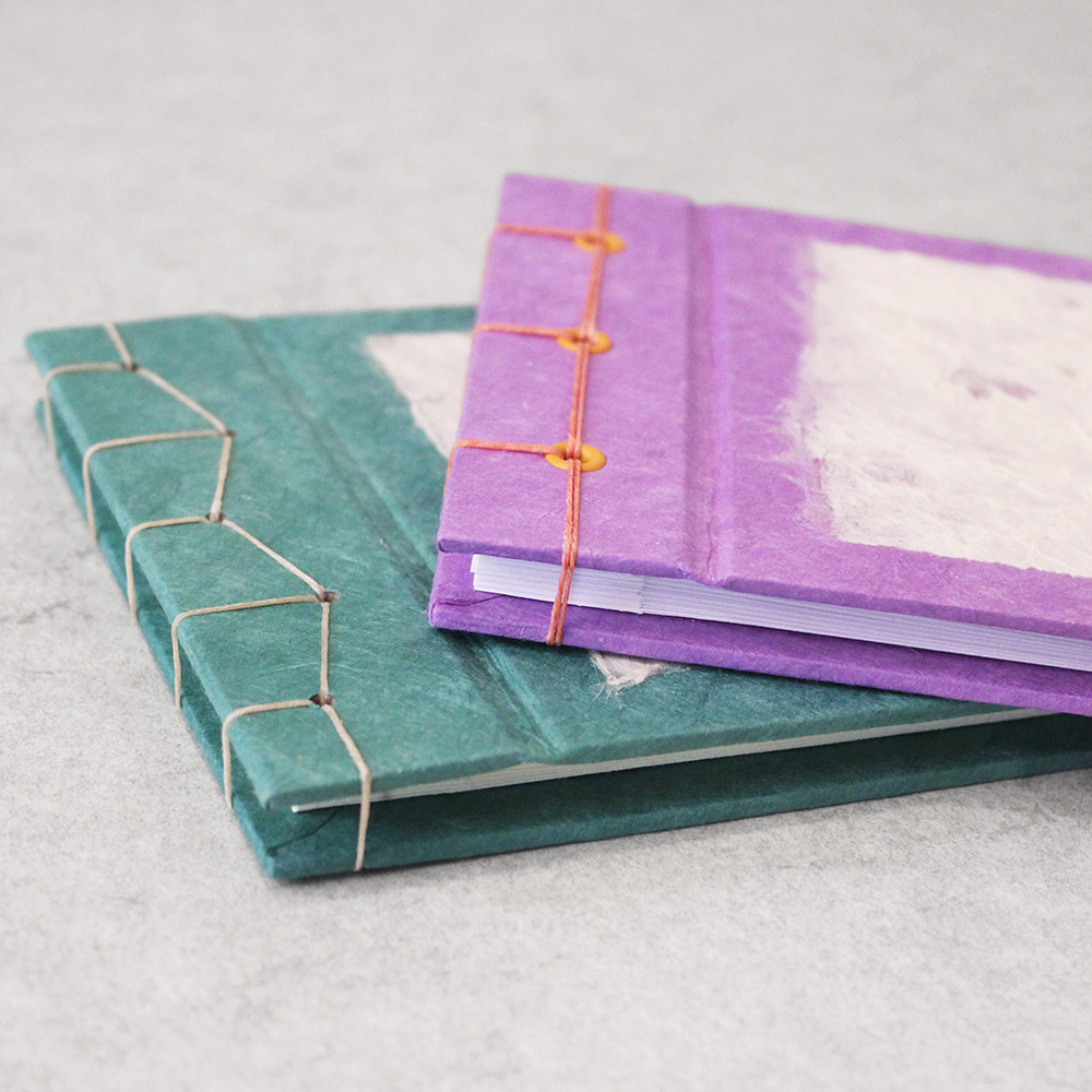 Archival Photo Book - Japanese Stab Binding class sapmes showing two stitch variations