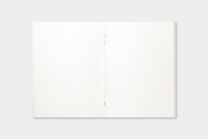 TRAVELER'S notebook Passport size Sketch Paper Refill has 32 pages with a stapled binding.