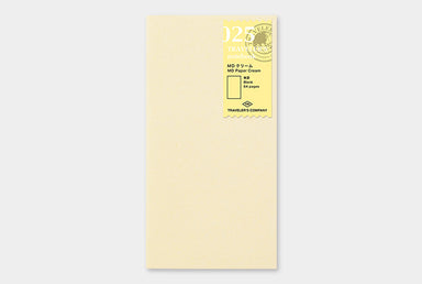 The TRAVELER'S notebook MD Cream Paper refill features smooth MD cream colored paper. 