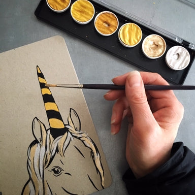 Natural cover takes paint, pencil, crayon, and pen equally well. 