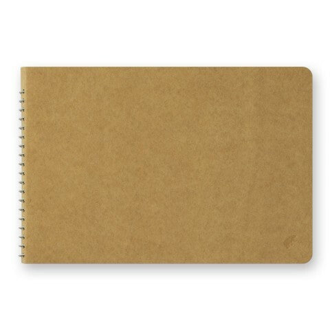 Traveler's Company spiral bound B6 notebook with blank white MD paper has a heavy kraft cover ready for your decorations! 